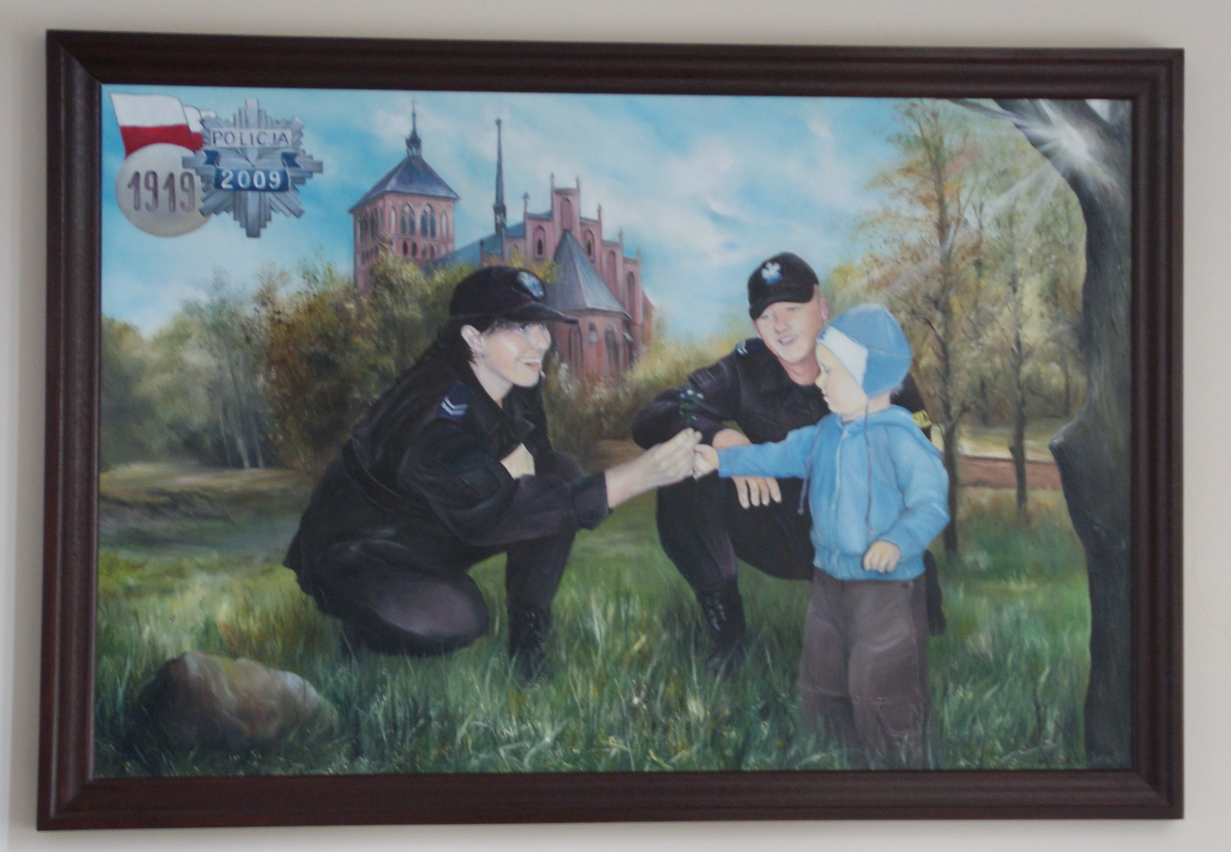 Obraz znajdujący się w holu Komendy Powiatowej Policji w Braniewie, którego współautorem jest st.asp.Orłowski